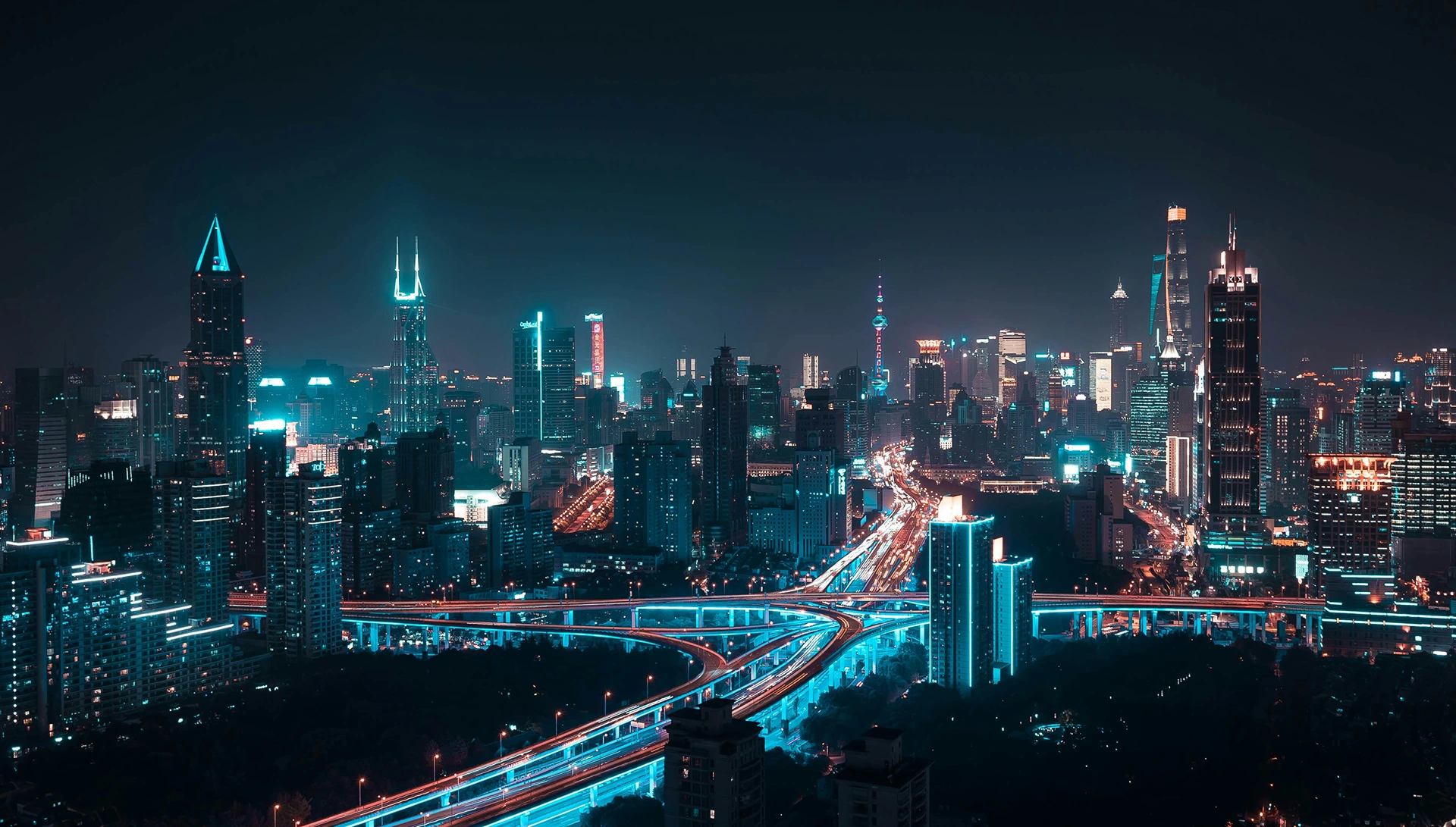 Illuminated smart city at night showcasing MapMetrics urban mapping network and location-based rewards system